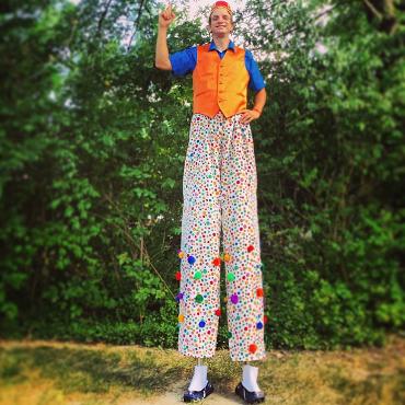 Jumpin' Joe stilt walking at a carnival